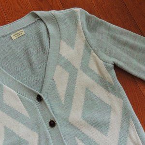 Diamond patterned button up sweater.